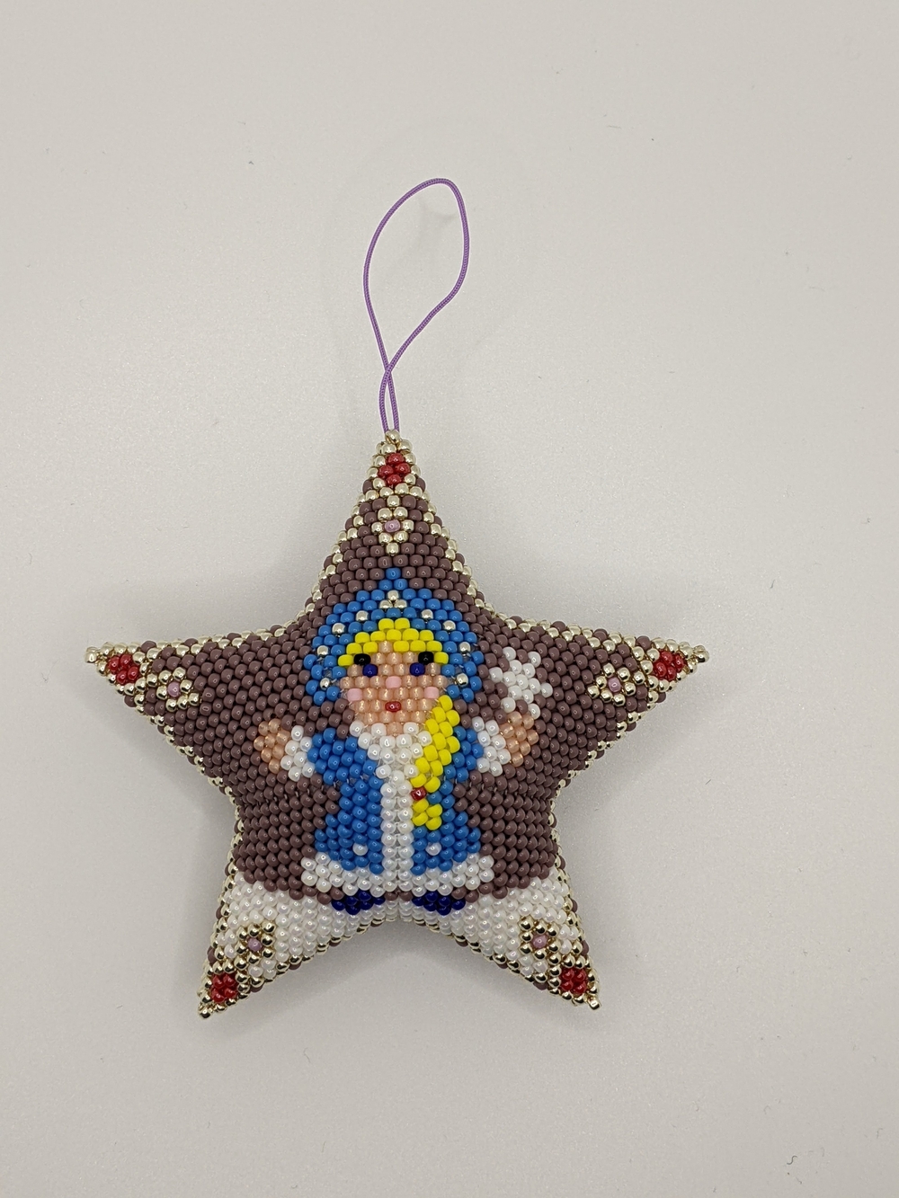 Beaded Star Ornament with Blue and Yellow Figure